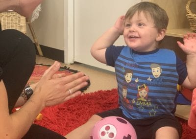 child playing with educator at childcare Mayfield
