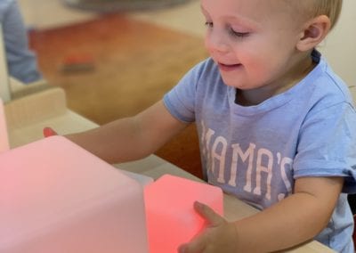child playing with blocks at Mayfield daycare